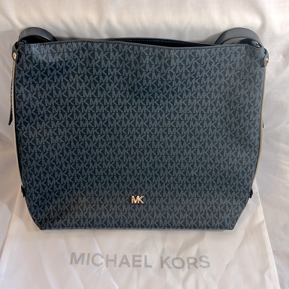 Large MK beautiful blue MK design tote bag with attached zippered pocket.
